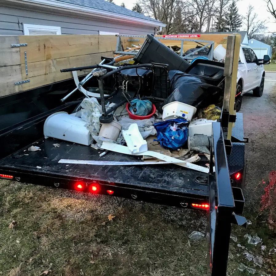 Roll-off dumpster delivered to a residential driveway in Neenah